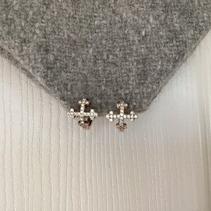 Delicate pave’ hoop huggies in gold metal